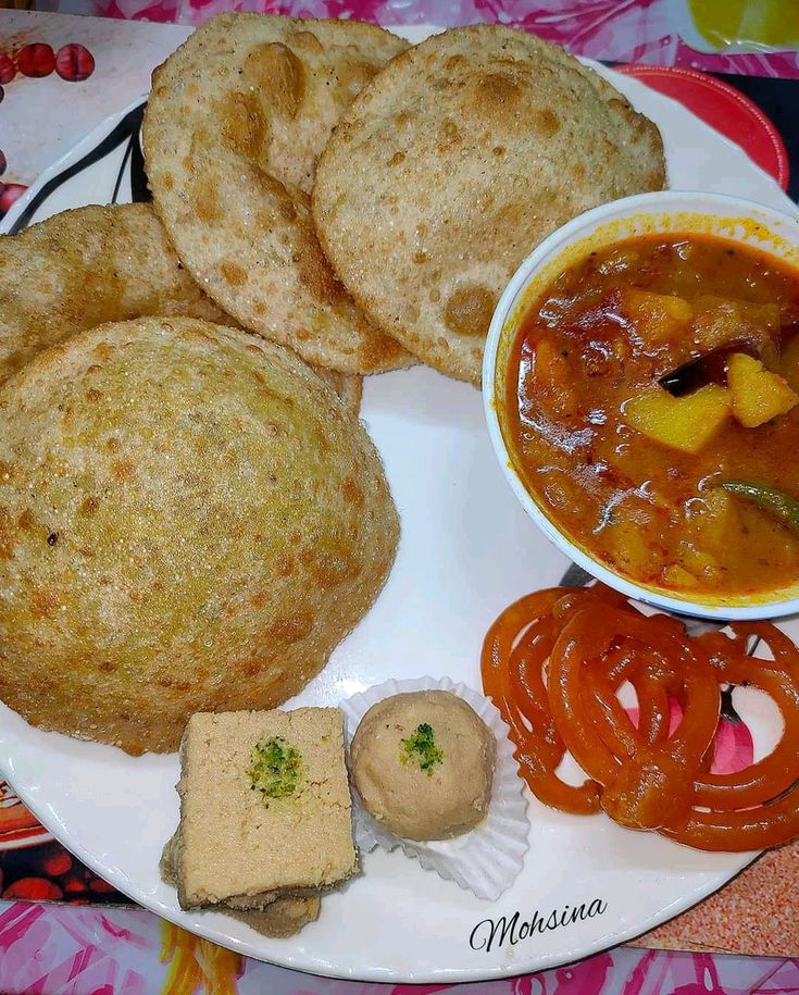 a white plate topped with different types of food