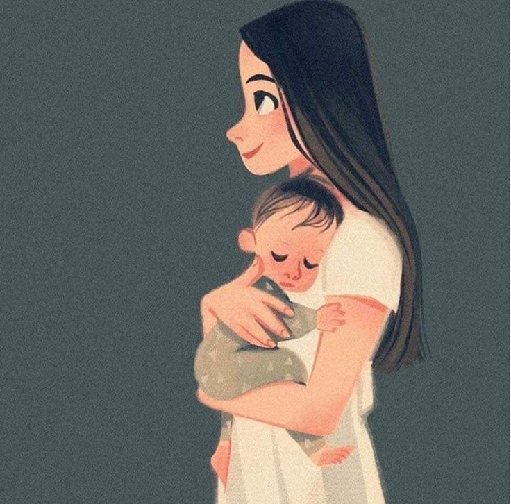 a woman holding a baby in her arms