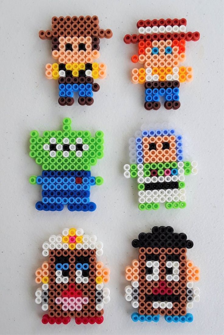 four legos made to look like cartoon characters