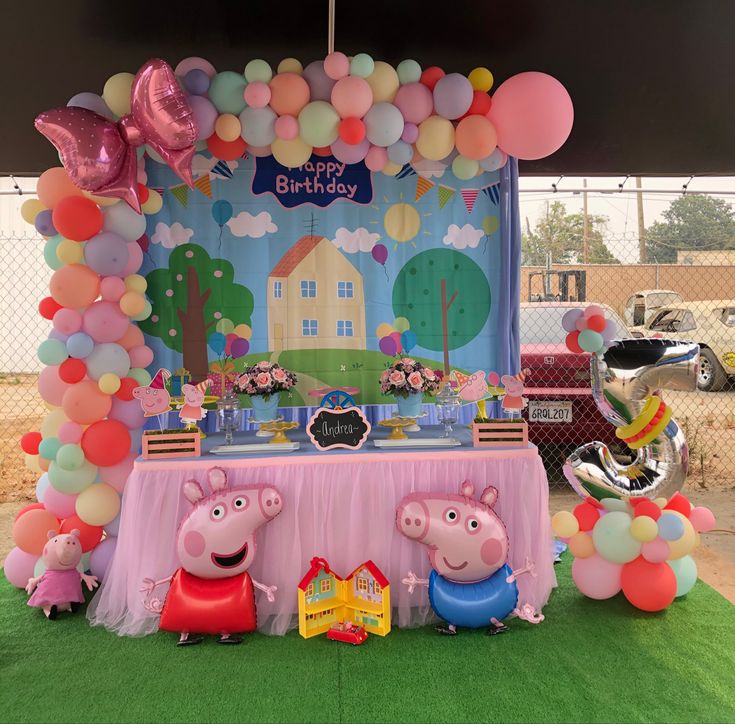 peppa pig birthday party with balloons and decorations