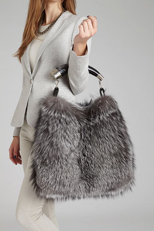 A real Argentine cow horn is used as a handle for this natural gold fox fur handbag. 15% off your first purchase! Free shipping over $100; 30-day returns. Order online today. Luxury Everyday Sheepskin Bags, Luxury Faux Fur Shoulder Bag, Luxury Faux Fur Shoulder Bag With Fur Lining, Luxury Rectangular Faux Fur Shoulder Bag, Luxury Faux Fur Rectangular Shoulder Bag, Elegant Faux Fur Bags, Luxury Evening Bags In Faux Fur, Luxury Faux Fur Evening Bag, Elegant Winter Bags With Faux Fur Trim