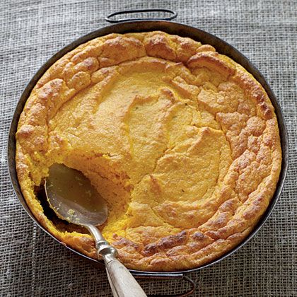 a pie in a pan with a spoon