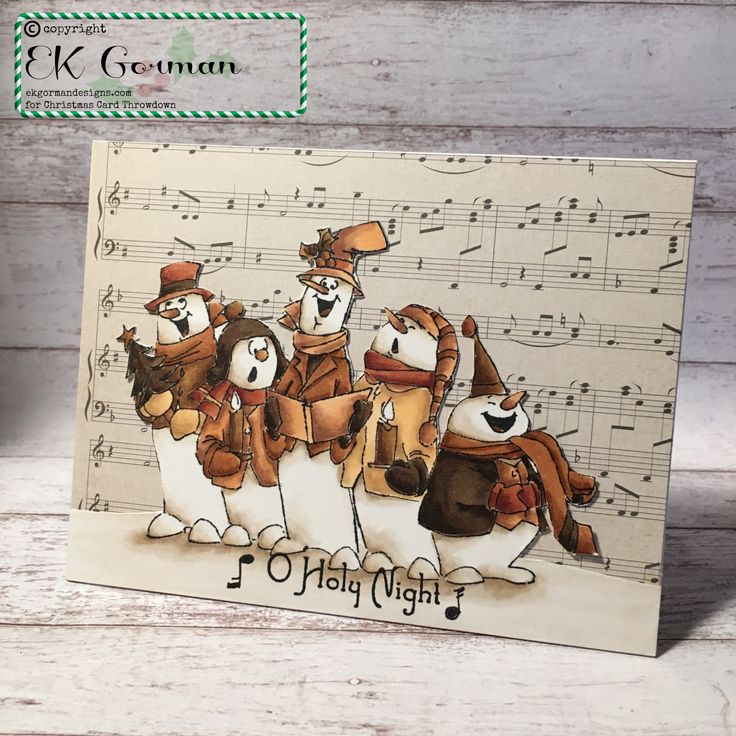 a card with penguins and musical notes on it