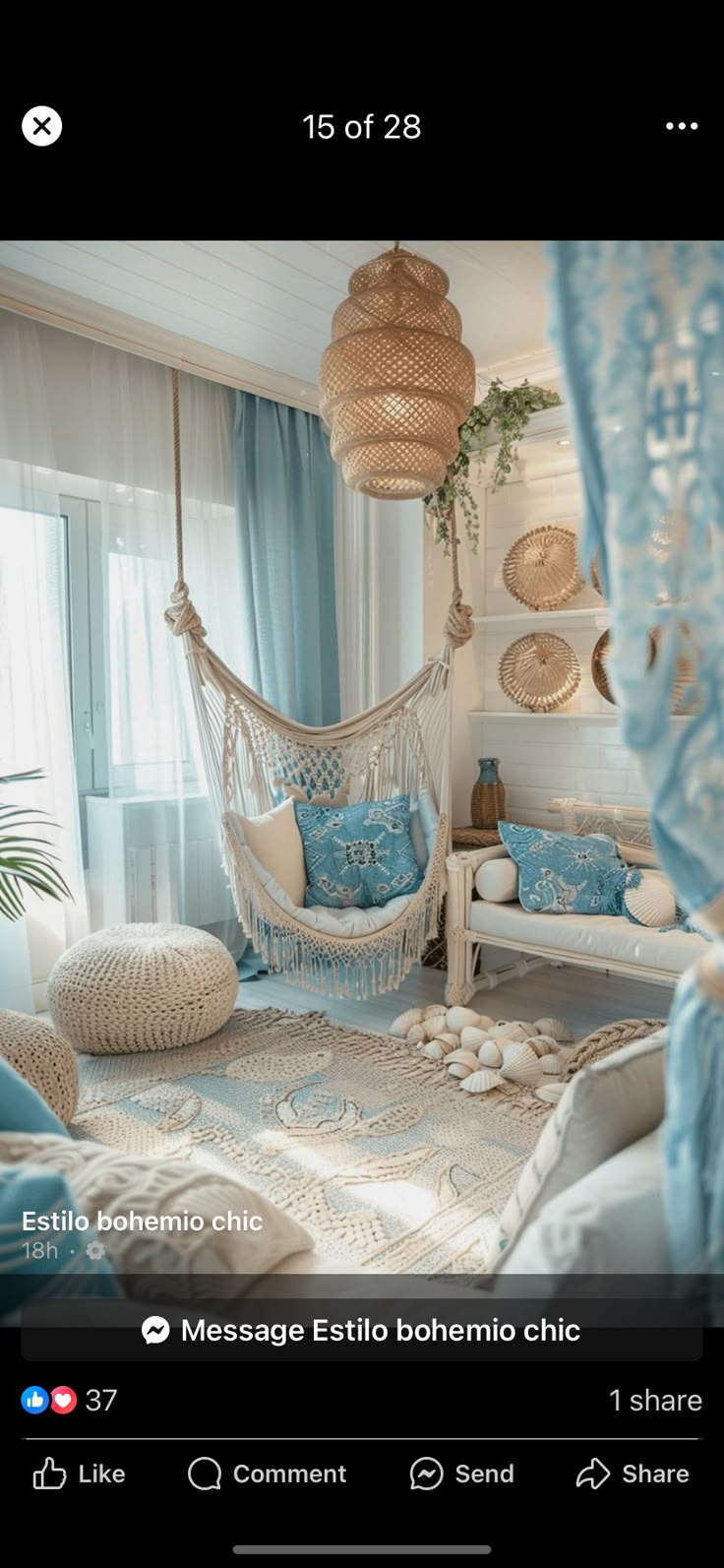 a bedroom with blue and white decor on the walls