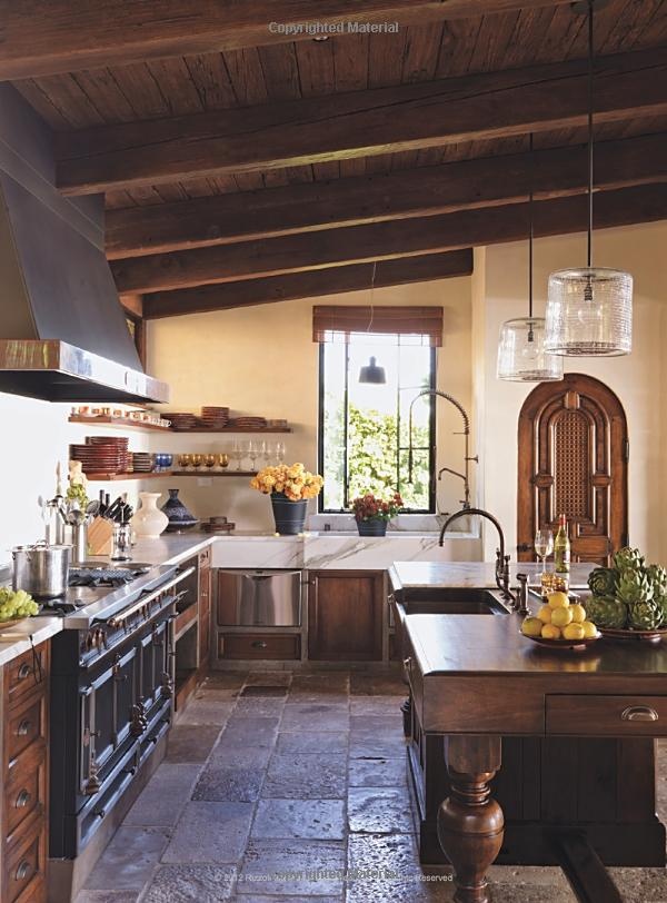 a large kitchen with an island in the middle