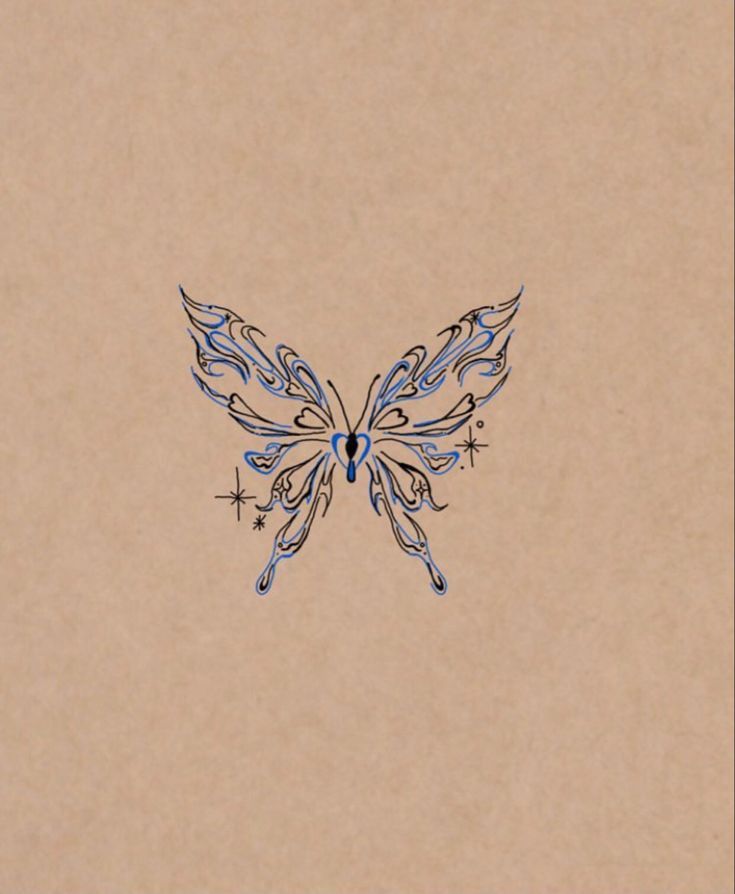 a drawing of a butterfly on a piece of brown paper with stars around the wings