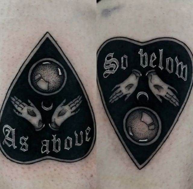 two black and white tattoos on the chest