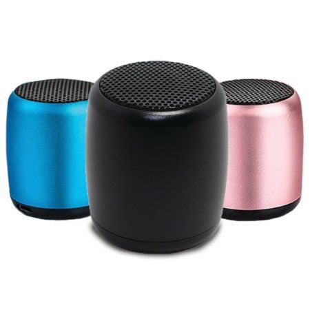 three different colored speakers sitting next to each other