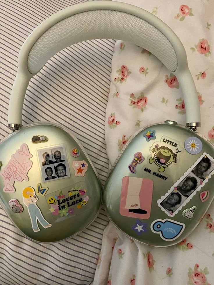 the headphones are decorated with stickers on them