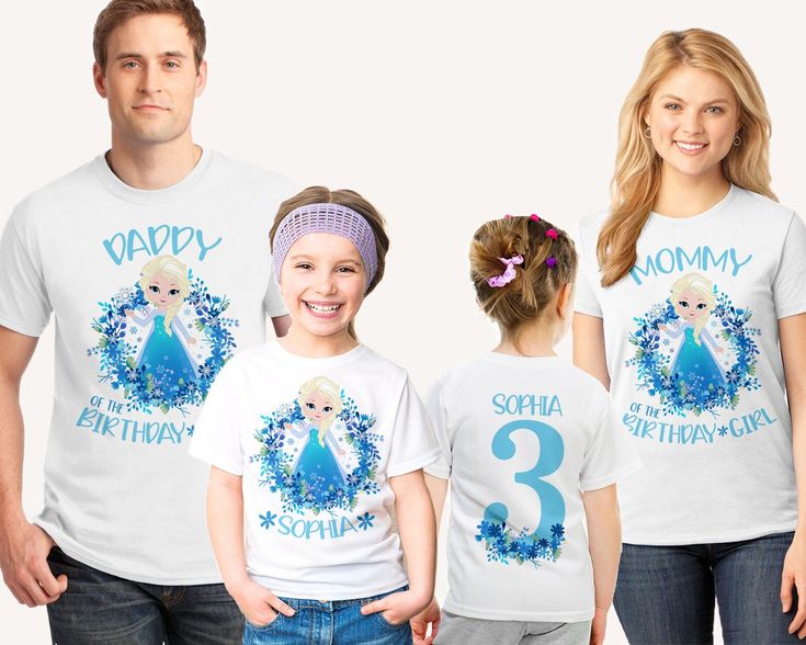 two adults and one child wearing matching shirts with the number three on them, standing next to each other