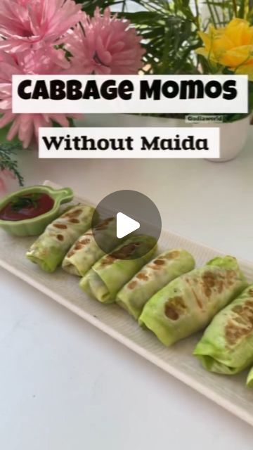 cabbage momos without maida on a plate with flowers in the background and text that reads cabbage momos without maida