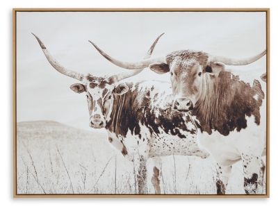 two longhorn cows standing in a field with large horns on their heads, looking at the camera