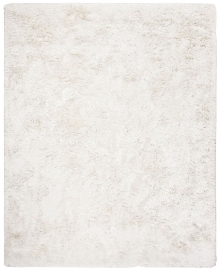 an area rug with white fur on the top and bottom, it is very soft