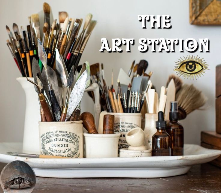 the art station is full of brushes and other things