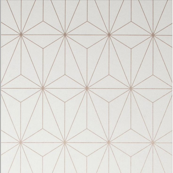 a white and beige wallpaper with geometric shapes