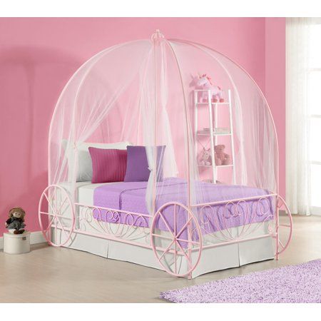 a pink and white bed with a canopy over it