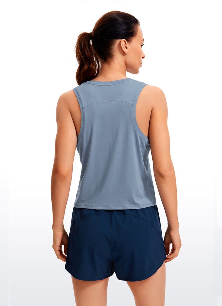 Ultra-lightweight and soft fabric with good breathability to keep you cool, and ultra-fine brushed feel for a comfortable and skin-friendly experience. High neck sport tank top with oversized armholes allows you to move freely without restraint. Great for running, exercise and other intense sports. Feature & Fitting: 
 Design for running, exercise 
 Cropped length, loose-fitting 
 Oversized armholes and high neck 
 Fabric: 
 Soft and lightweight fabric 
 Ultra-fine brushed feel 
 Four-way st Moisture-wicking Tank Top For Gym, Versatile Moisture-wicking Tank Top For Gym, Stretch Gym Vest Top, Light Support Sleeveless Sports Bra, Seamless Racerback Sports Top, Athleisure Sleeveless Sports Bra With 4-way Stretch, Sporty Sleeveless Sports Bra With 4-way Stretch, Sleeveless Sports Bra With 4-way Stretch For Gym, Blue Breathable Sleeveless Tank Top