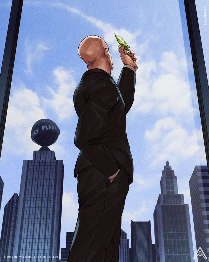 a man standing in front of a tall building holding a cell phone up to his ear