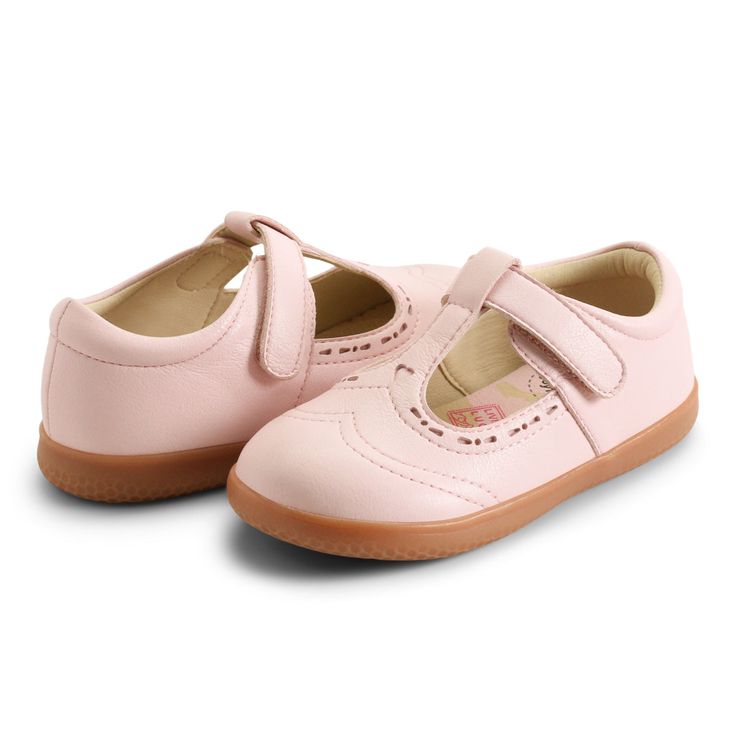 A sweetheart style with a cut-out heart detail. This gorgeous t-strap celebrates the wonders of childhood every day. Even sweeter, this EZCare™ vegan shoe is washable. 100% Vegan EZCare™ machine-washable high-performance synthetic upper with DuraPlay™ technology for long-lasting wear Breathable vegan lining with EcoBreathe™ antimicrobial technology Hook & loop closure for easy on and off Padded collar for comfort L&L MultiFit System™ footbed to help you know when it is time to size up Jumper sol Sporty Aesthetic, Ballet Pink, Round Toe Heels, Vegan Shoes, Mary Jane Shoes, Toddler Shoes, T Strap, Mary Jane Sneaker, Mary Janes