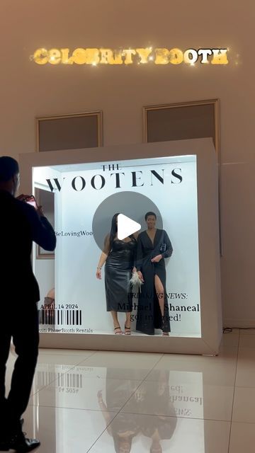 two people are standing in front of a window with the words the woolens on it