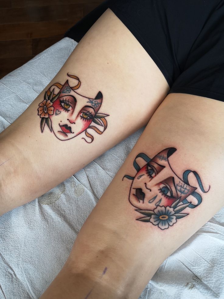 two women with matching tattoos on their legs