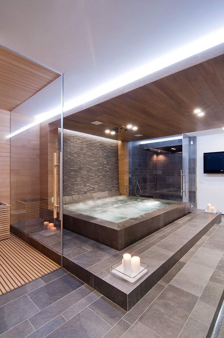 a spa room with a large jacuzzi tub