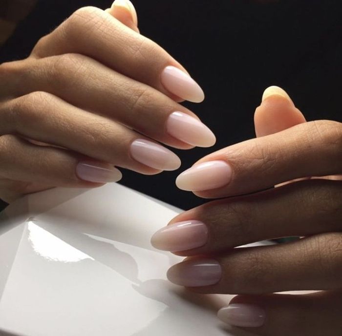 best-nude-nail-polish-in-a-light-creamy-pink-hue-on-two-slim-hands-wearing-an-oval-pointy-manicure-black-and-white-background Stars Nails, Manicured Nails, Elegant Manicure, Almond Shape Nails, Nail Art Wedding, Elegant Nails, Nail Shapes, Gel Manicure, Nude Nails