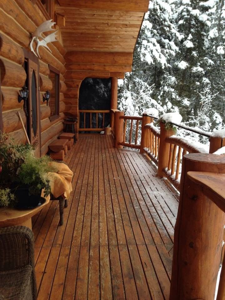 the front porch of a log cabin with woodworking for beginners and full time jobs