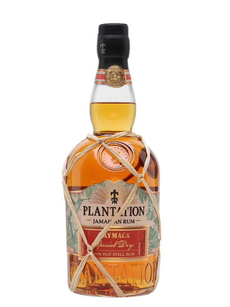 a bottle of planta - ion jamaica and rum on a white background with a brown ribbon around it