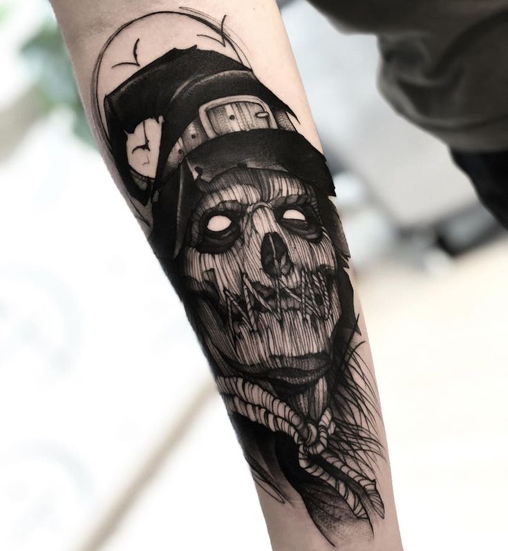 a skull with a hat on it's head is shown in this tattoo design