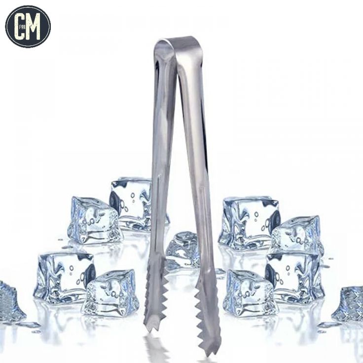 a pair of tongs sitting on top of ice cubes next to each other