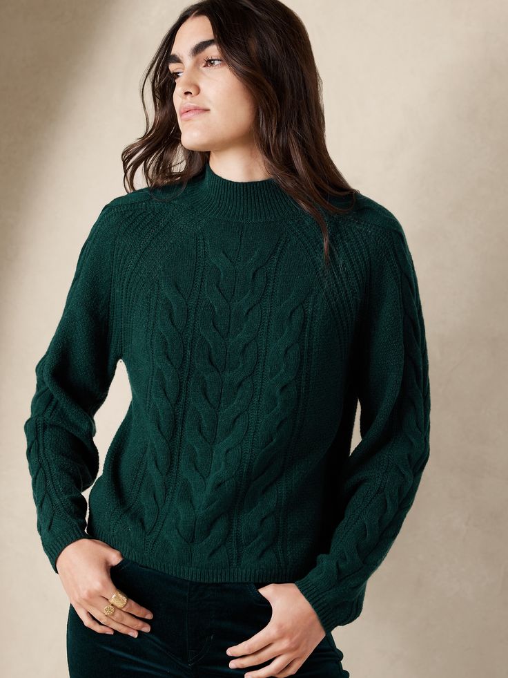 What's romance without a touch of whimsy? This cozy sweater is knit from a luxurious blend of beautiful, warm Merino wool with classic cable-knit patterns, thoughtful volume sleeves and a mock neck to cover the flush of skin that comes with first lov Green Turtleneck Sweater, Volume Sleeves, Cable Knit Turtleneck Sweater, Professional Wardrobe, Cable Knit Jumper, Boho Fall, Wool Turtleneck, Banana Republic Sweater, Cozy Sweater