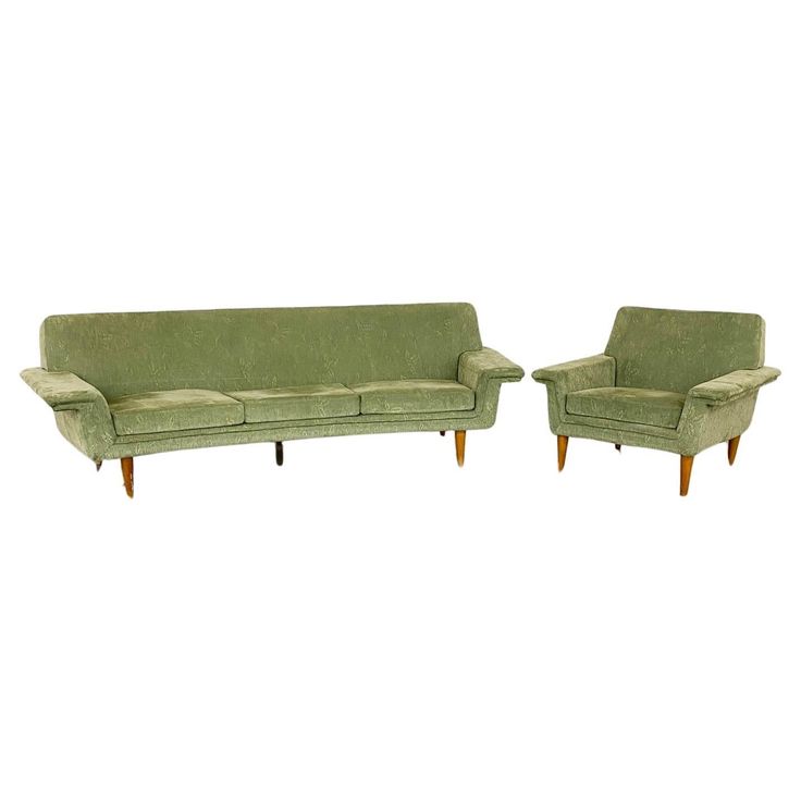 two green couches sitting next to each other