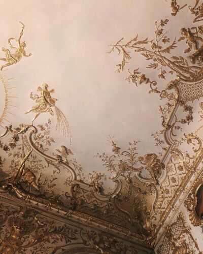 an ornately decorated ceiling with gold paint