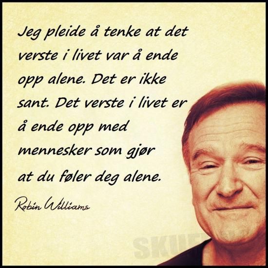 a man with a smile on his face in front of a quote from robin williams