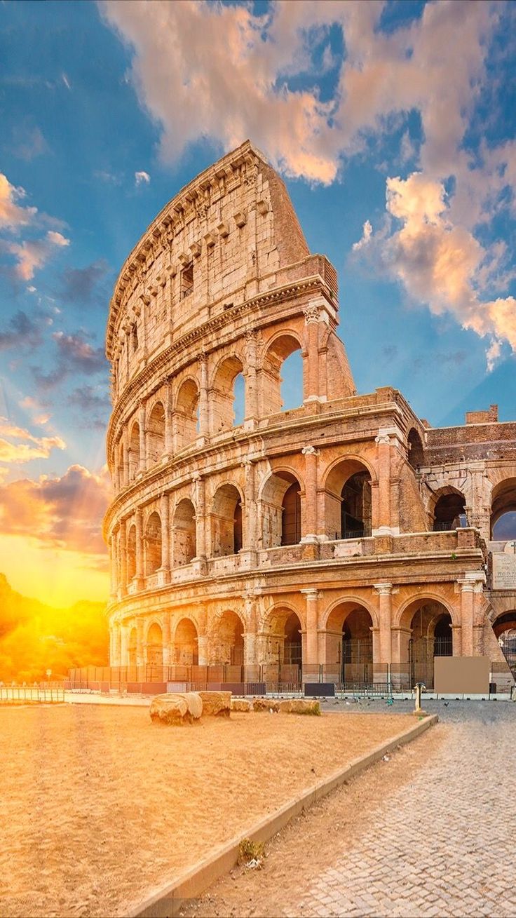 the roman colossion in rome at sunset