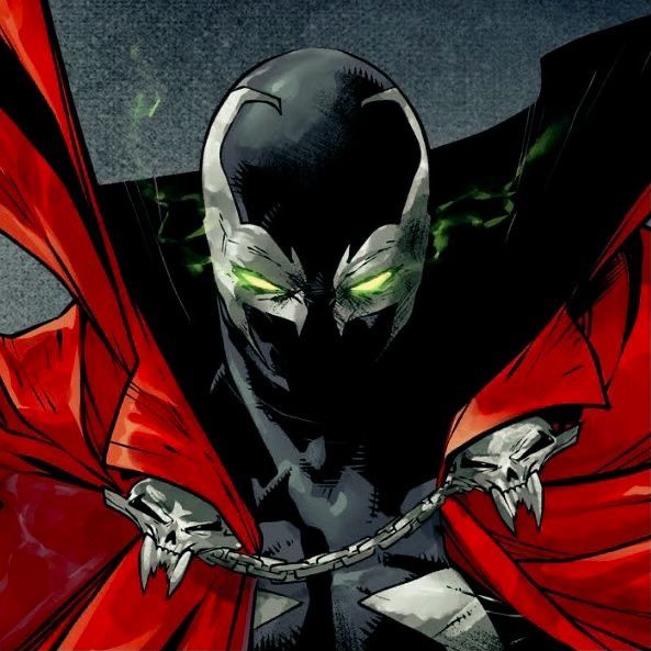 an image of a man with green eyes wearing a red cape and chain around his neck