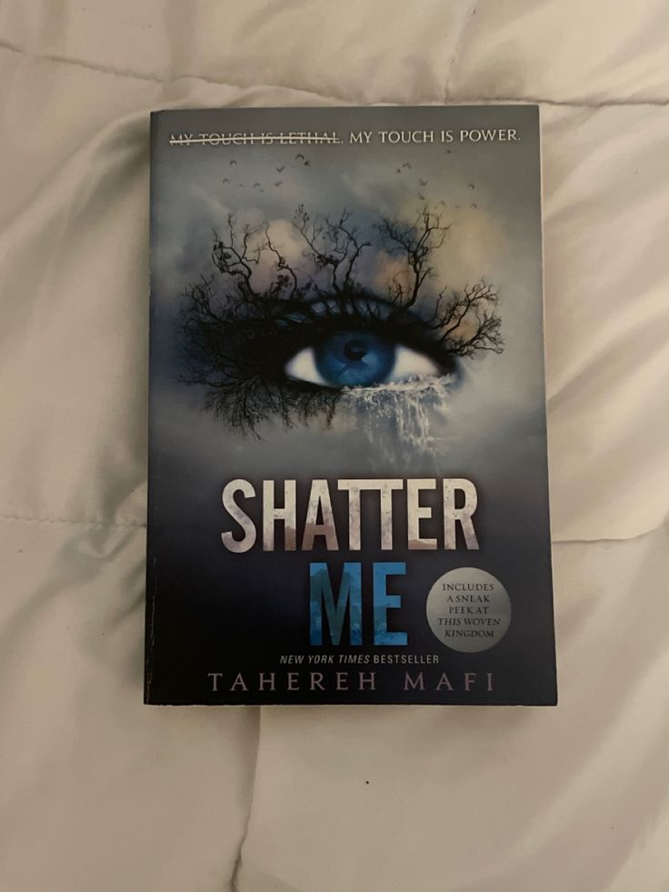 the book cover for shattered me by tahreeh mahi is laying on a bed