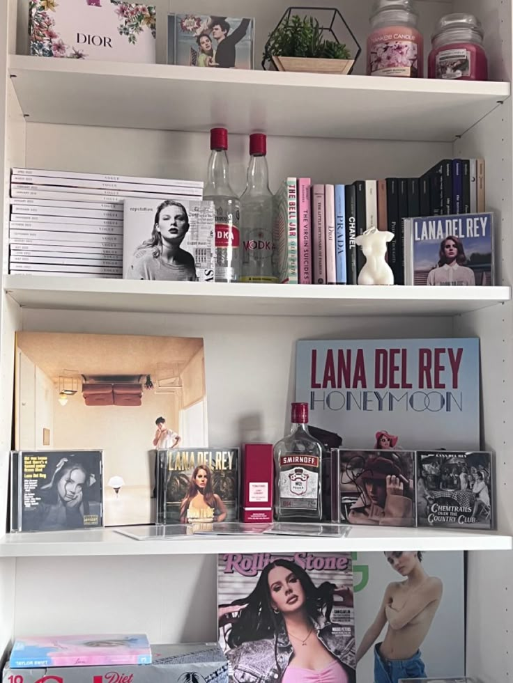 a book shelf filled with books and magazines