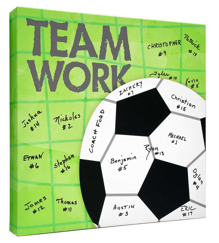 a soccer ball with the words team work written all over it on a green background