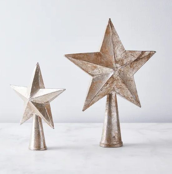 two metal stars on top of each other