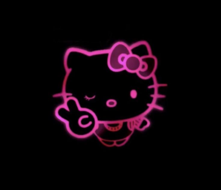 the hello kitty logo is lit up in pink