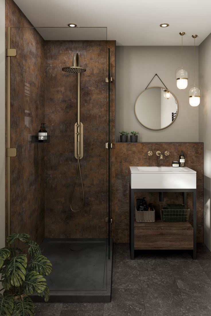 a bathroom with a sink, mirror and shower stall in it's center area