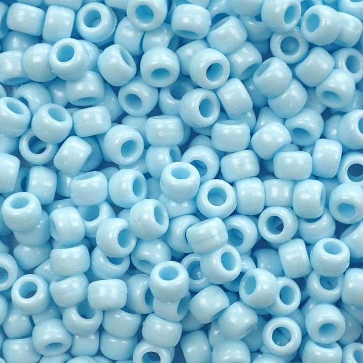 blue glass beads with holes in the middle