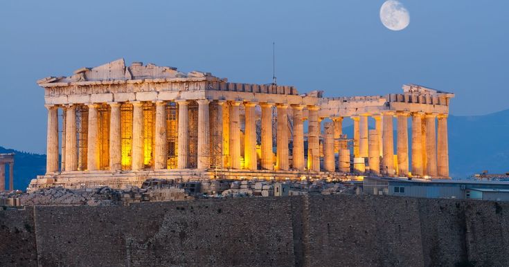 an image of the partheny at night with the moon in the sky