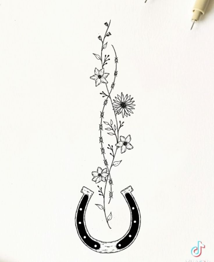 a drawing of a flower with a horseshoe on the side and flowers growing out of it