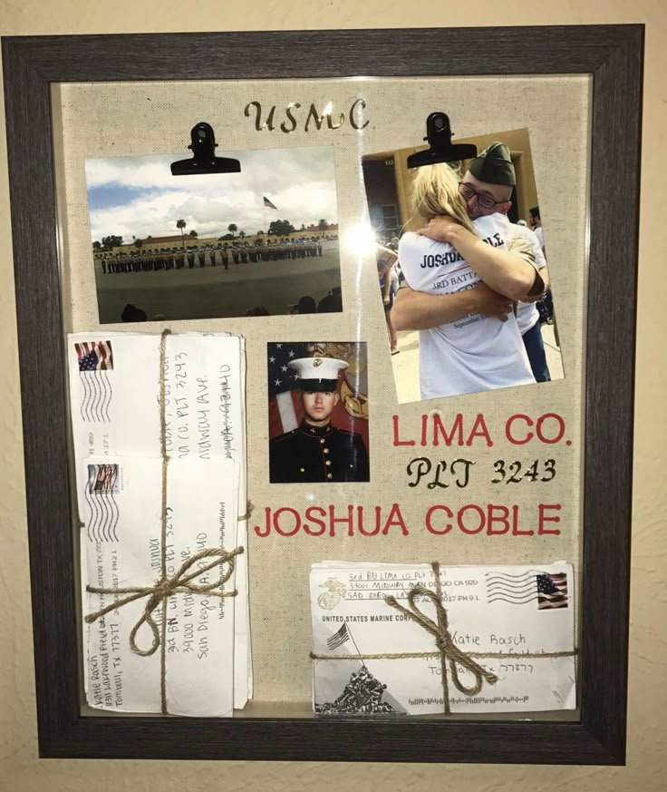 a couple is hugging in front of the white house with photos and letters attached to it