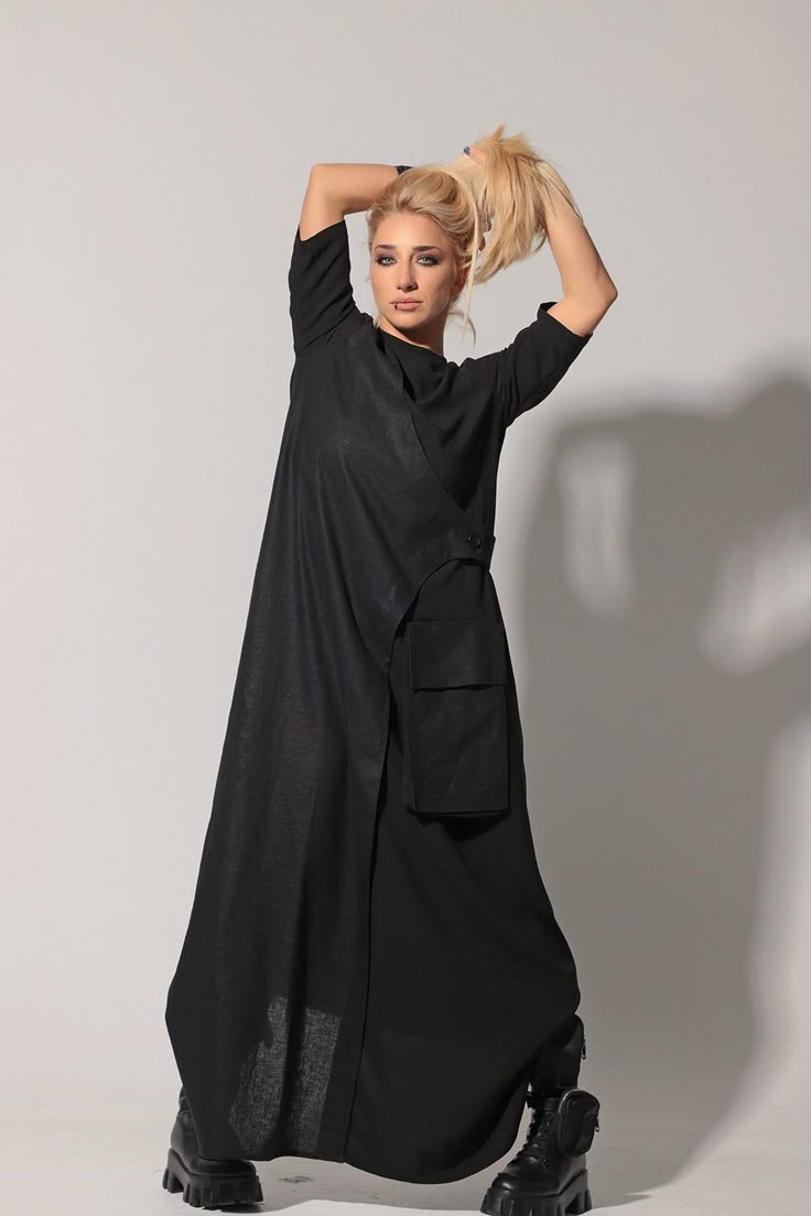 Black Linen Dress, Linen Maxi Dress, Linen Clothing Maxi jersey dress with linen details and large side pocket: |DOI| GARMENT FEATURES: *Clean, relaxed maxi silhouette *Classic crew neckline *Full maxi length *Mid length sleeves *Front and back linen overlayer details with side buttoning *Oversized pocket with flap on one side *Made from quality viscose jersey COLOUR OPTIONS: This product also comes in the following colour options: -black; -white. SIZE & FIT: Model is 175cm and wears size S. Maxi Dress Linen, Linen Kaftan, Black Linen Dress, Long Linen Dress, Mid Length Sleeves, Linen Clothing, Black Outfits, Dress For Summer, Dress Linen