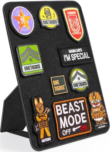 an assortment of pins and magnets are displayed on a black board with the words beast mode off