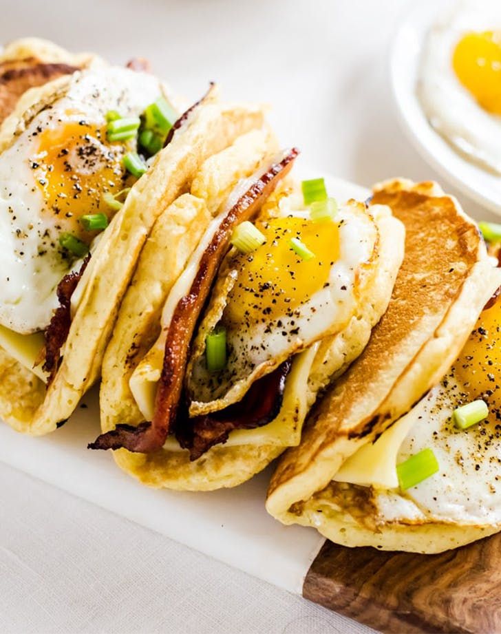 breakfast tacos with eggs, bacon and cheese